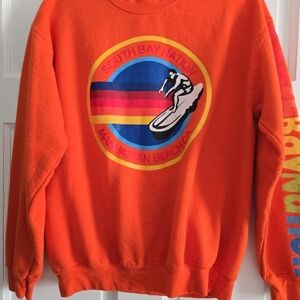 Vibrant Orange Graphic Sweatshirt
